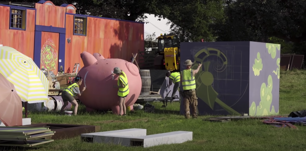 Photo of a person painting props for an event