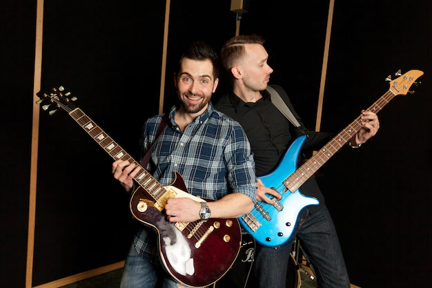 Guitars side by side, representing rivalry