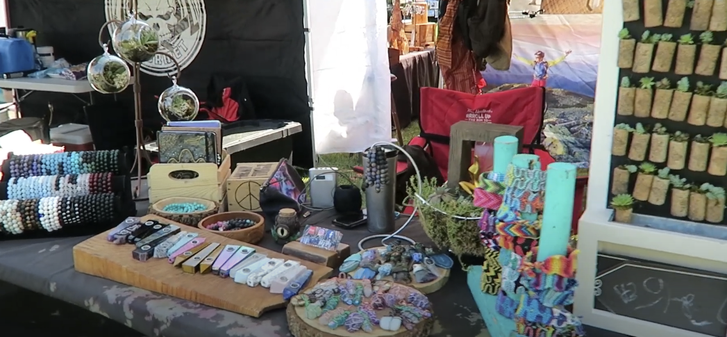 Photo of a merchandise booth with a wide array of items on display